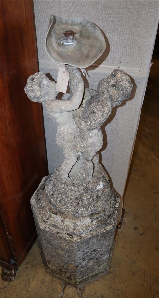 A reconstituted stone figural fountain, width 38cm, height 110cm